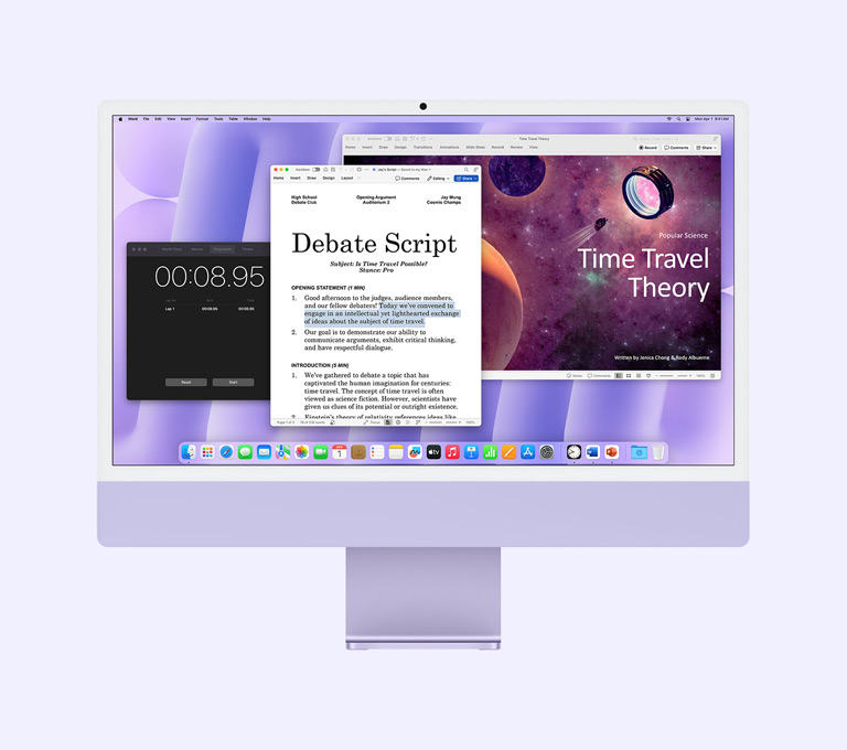 iMac mauve : l’écran affiche les apps Microsoft Word, Microsoft PowerPoint et Horloge.