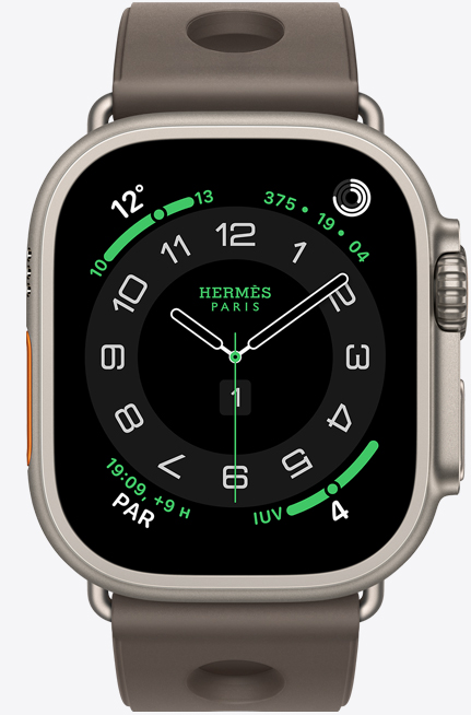 Apple Watch Hermès Ultra 3, caja de titanio, color natural, carátula Hermès Circulaire, complicaciones: clima, círculos de Actividad, hora de París, índice UV, parte lateral derecha, Digital Crown, micrófono, botón lateral en relieve, correa Scub'H Diving, color Gris Titane