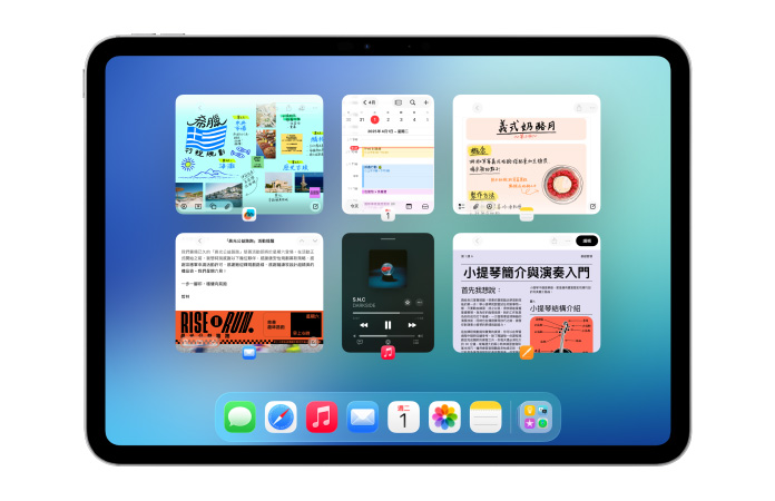 橫向放置的 iPad，螢幕中顯示⾏事曆和⾳樂等多款 app，以六個視窗整齊排成兩行