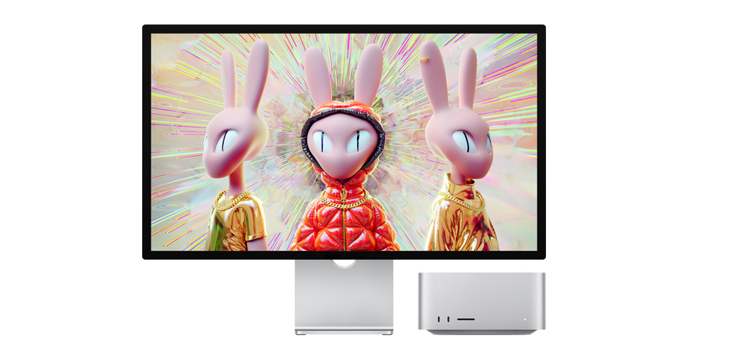 Mac Studio alongside Studio Display showing a 3D image of humanoid rabbit characters.